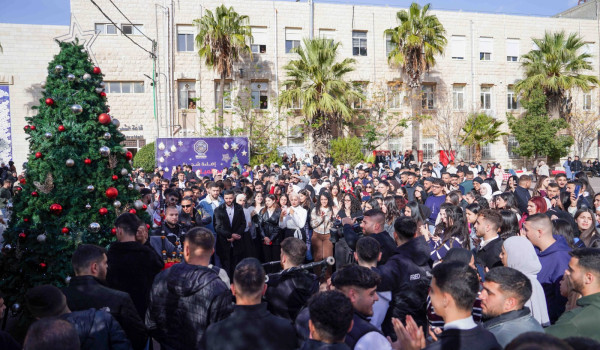 جامعة القدس تضيء شجرة الميلاد المجيد بحض...