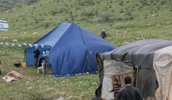 مستعمرون ينصبون خيمة استيطانية شمال رام ...