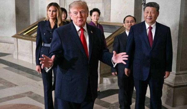السفير الأمريكي لدى الصين: ترامب عرض بيع...
