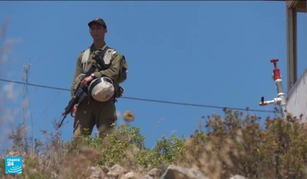 مستعمرون يشرعون بتجريف أراضٍ فلسطينية في...
