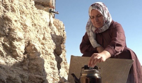 Palestinian Woman Struggles to Rebuild H...